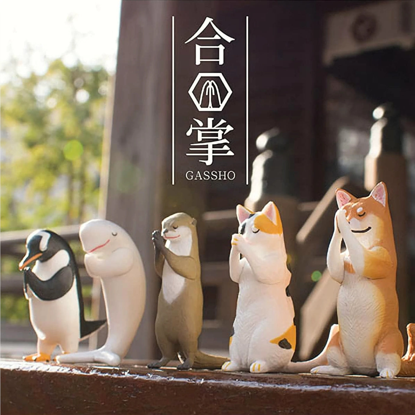 Yell’s Praying Animals Blind Box features five mystery animal figures—penguin, dolphin, otter, cat, and dog—sitting with paws together below “GASSHO” and Japanese text. Unbox a surprise collectible in every box!.