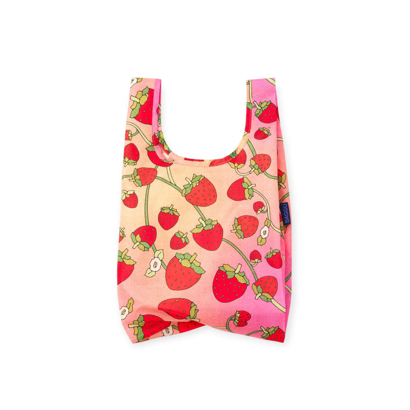 Strawberry print mini tote bag with wide opening and looped handles, pink base.
