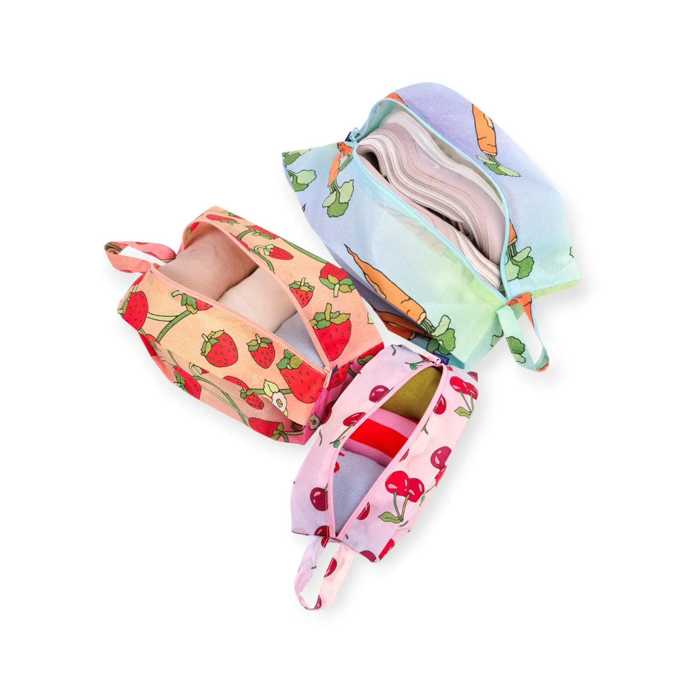 3D storage pouch set with mixed fruit and carrot prints, one pouch open