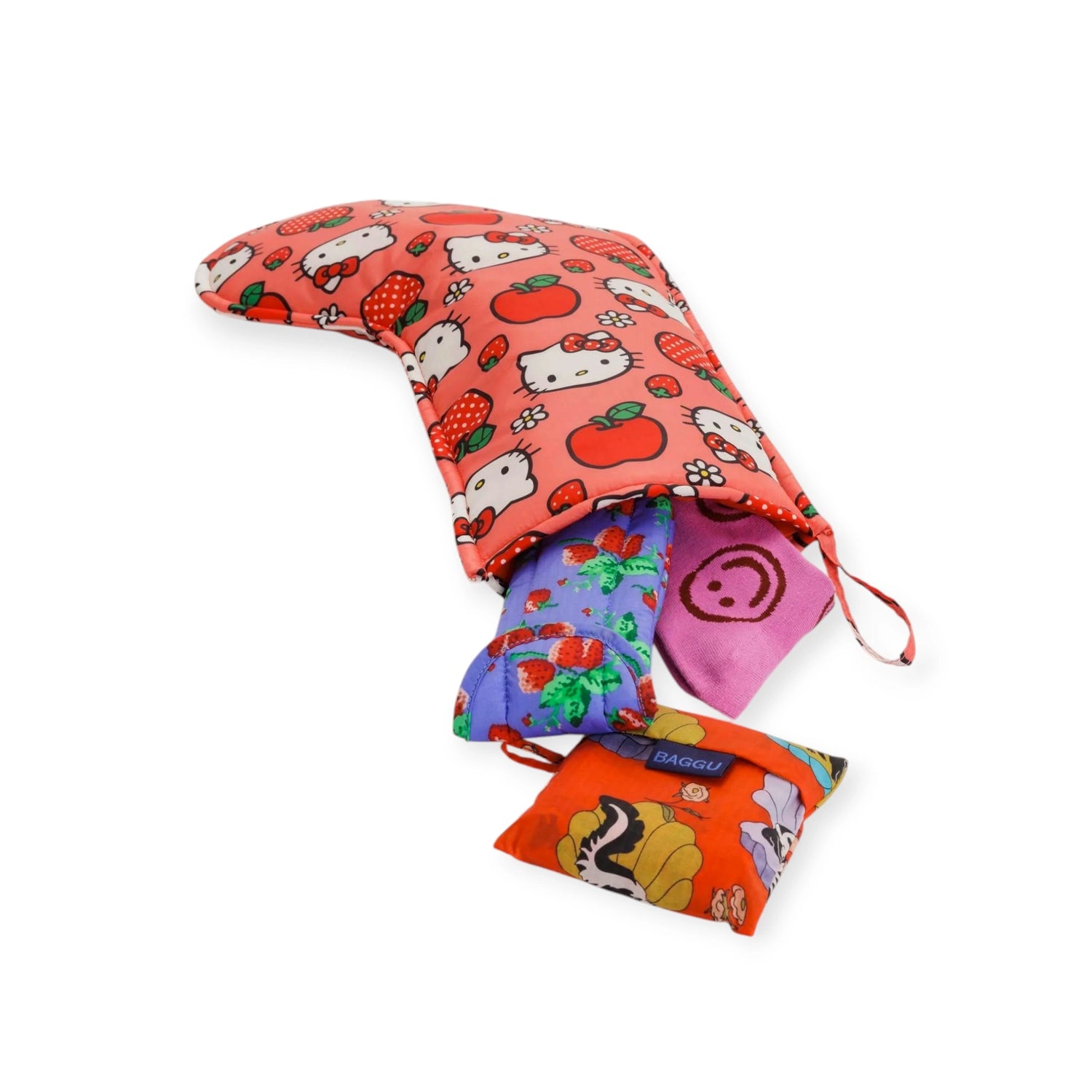 A Hello Kitty x Baggu Christmas Stocking in red, featuring cartoon characters with a Hello Kitty Apple print. It's partly open, displaying three smaller fabric bags with assorted designs like a pink smiley face and strawberries, all made from recycled ripstop nylon.