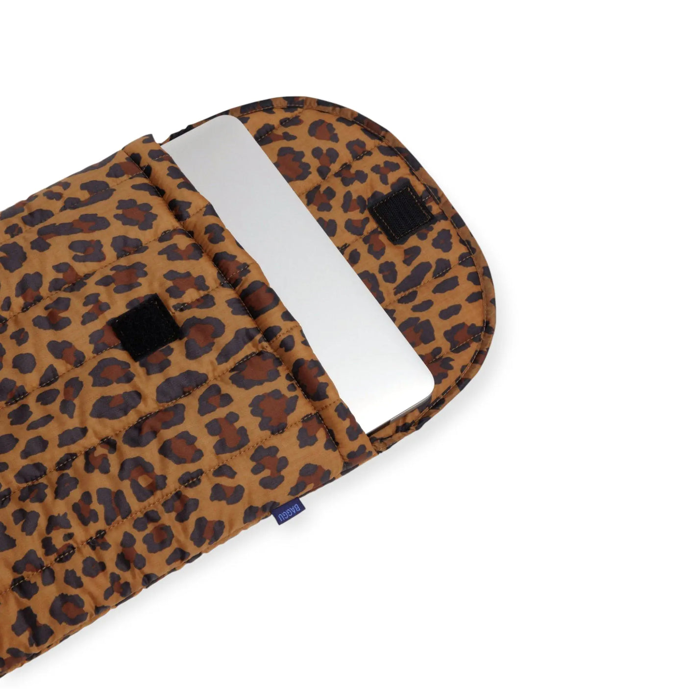Puffy leopard-print laptop case shown from side with black label patch and open flap