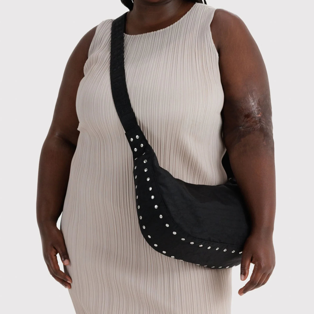 Medium crescent nylon bag in black with silver studded strap