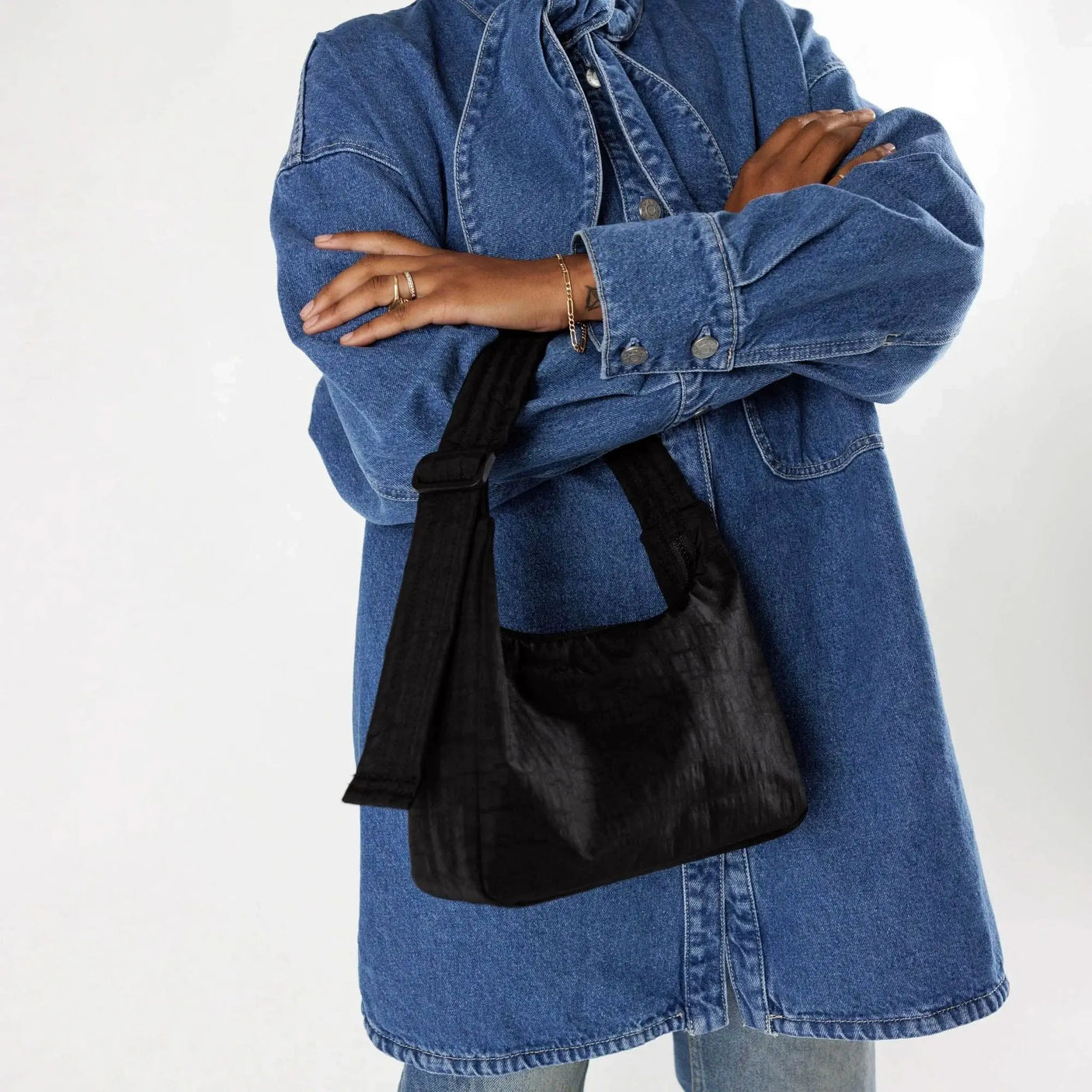 Baggu mini nylon shoulder bag, black with adjustable strap and drawstring side pocket