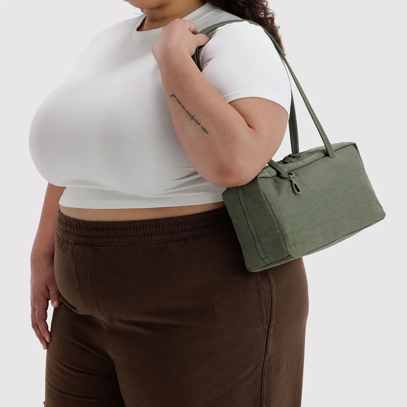 Baggu nylon bowler bag in olive green, zip top and short handles