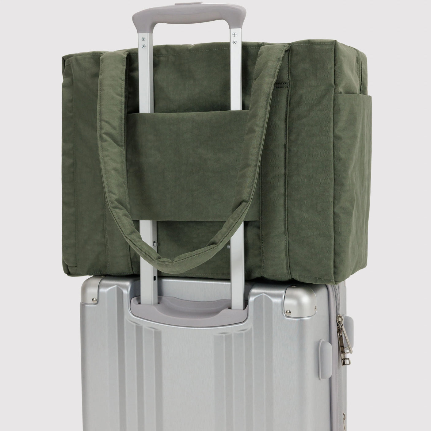 Olive green cloud carry-on tote bag with suitcase-handle sleeve and zip pocket