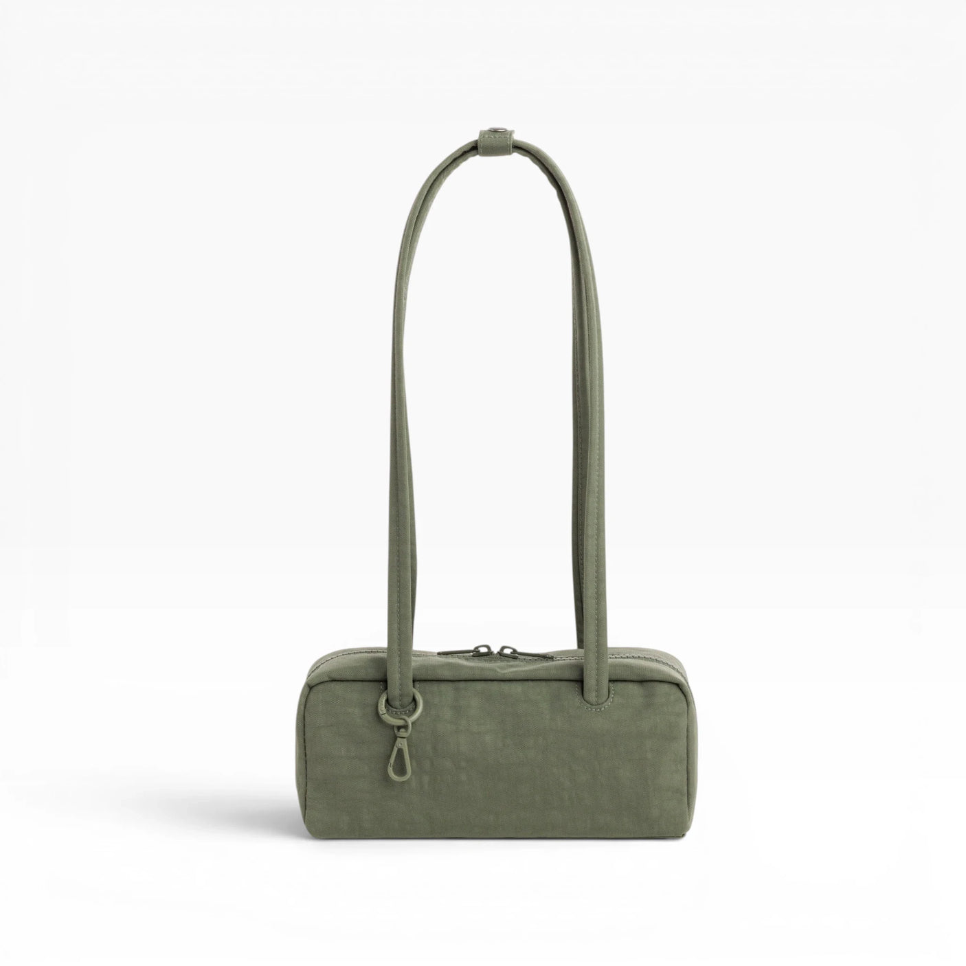 Olive small bowler bag with arched top handles and compact rectangular shape.