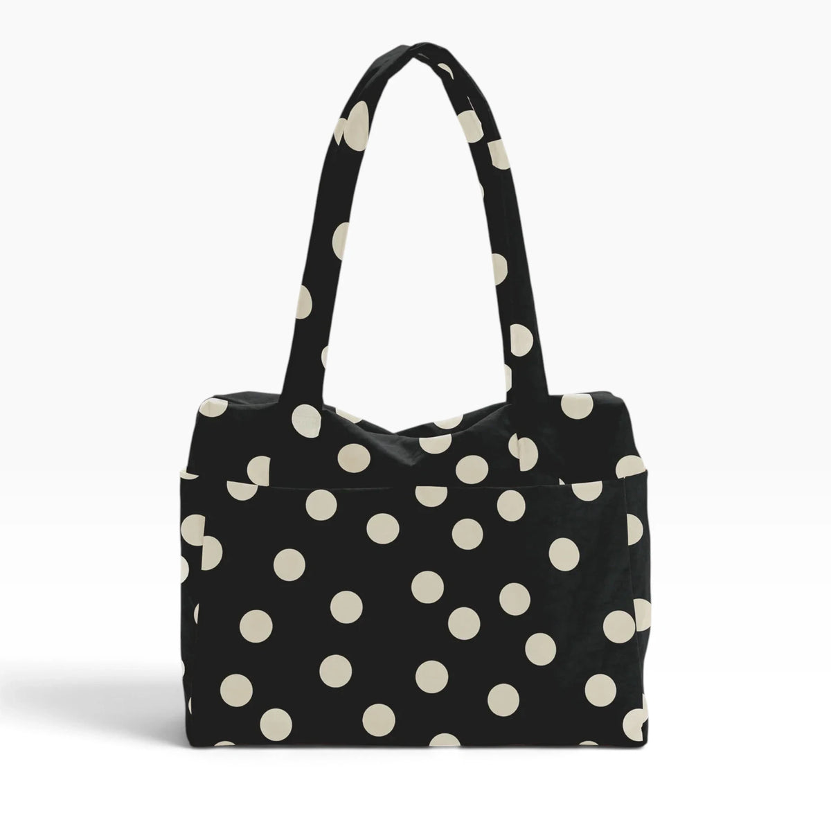 Polka-dot tote bag in black with cream dots, top handles, roomy open shape