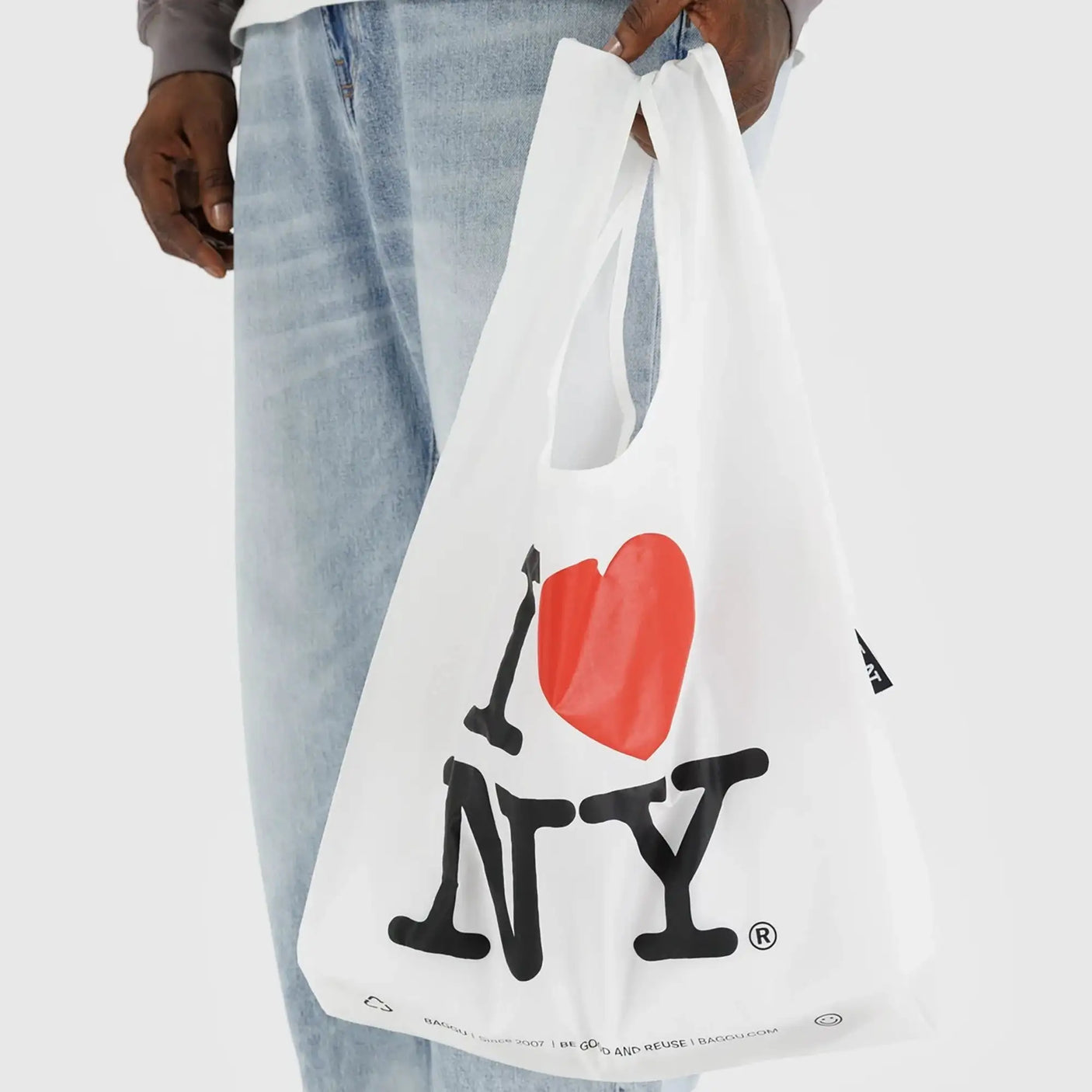 White tote bag with large red heart and I Love NY text, side view