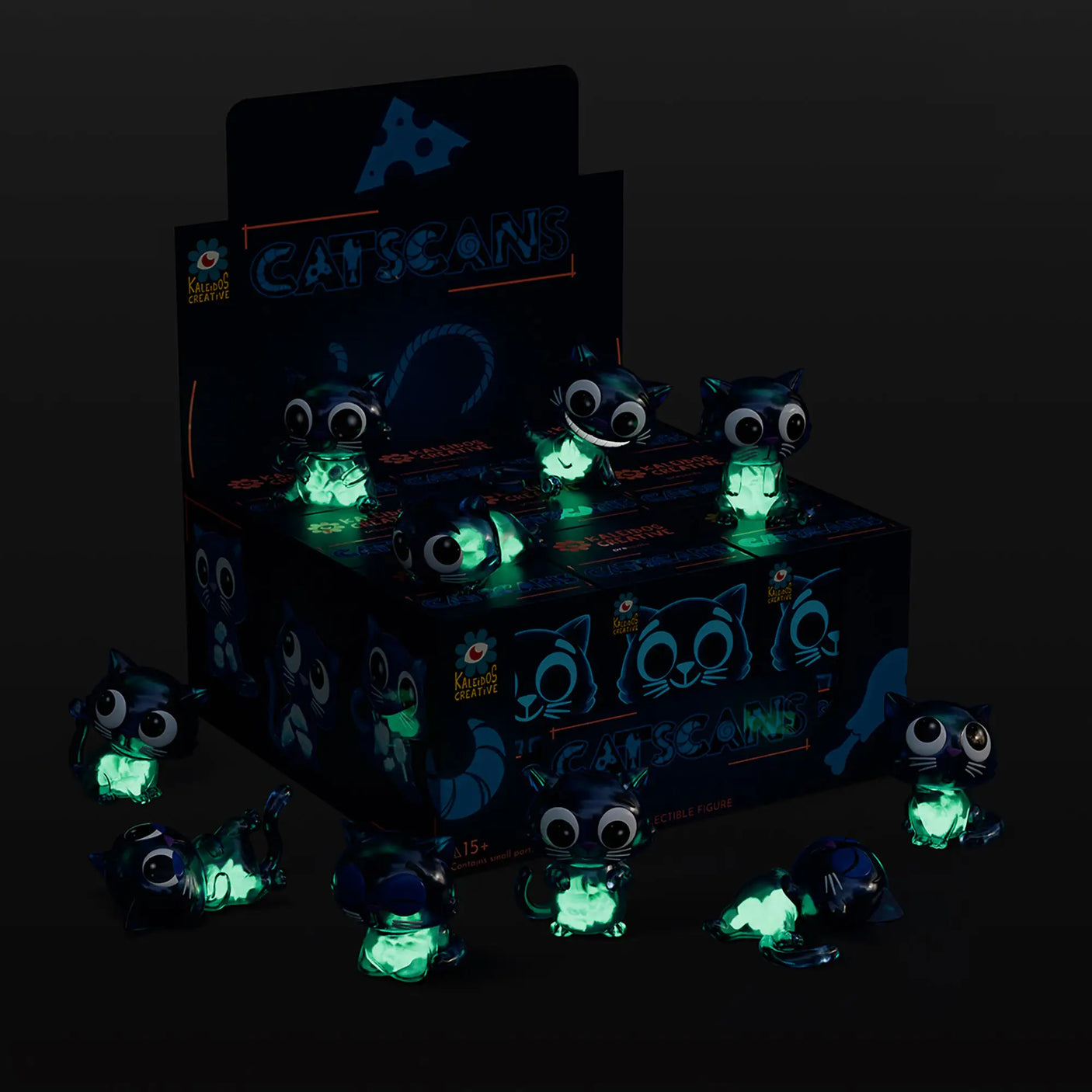 Collectible blind box with glowing cat-scan figures and box packaging