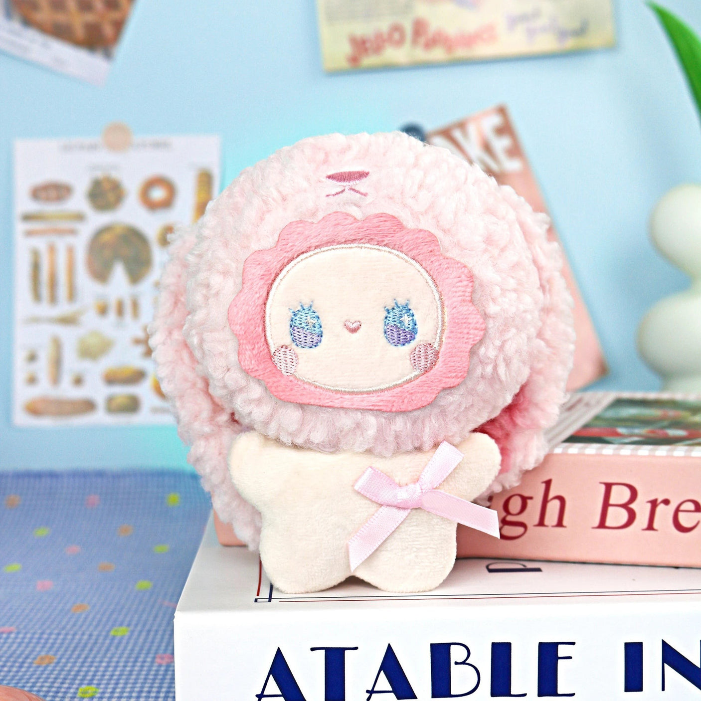 The Lucky Emma Fuzzy Family Keychain Blind Box features a plush toy with a pink fluffy hood, embroidered blue eyes, and a pink bowβperfect as a cute keychain or bag charm to add to your collection.