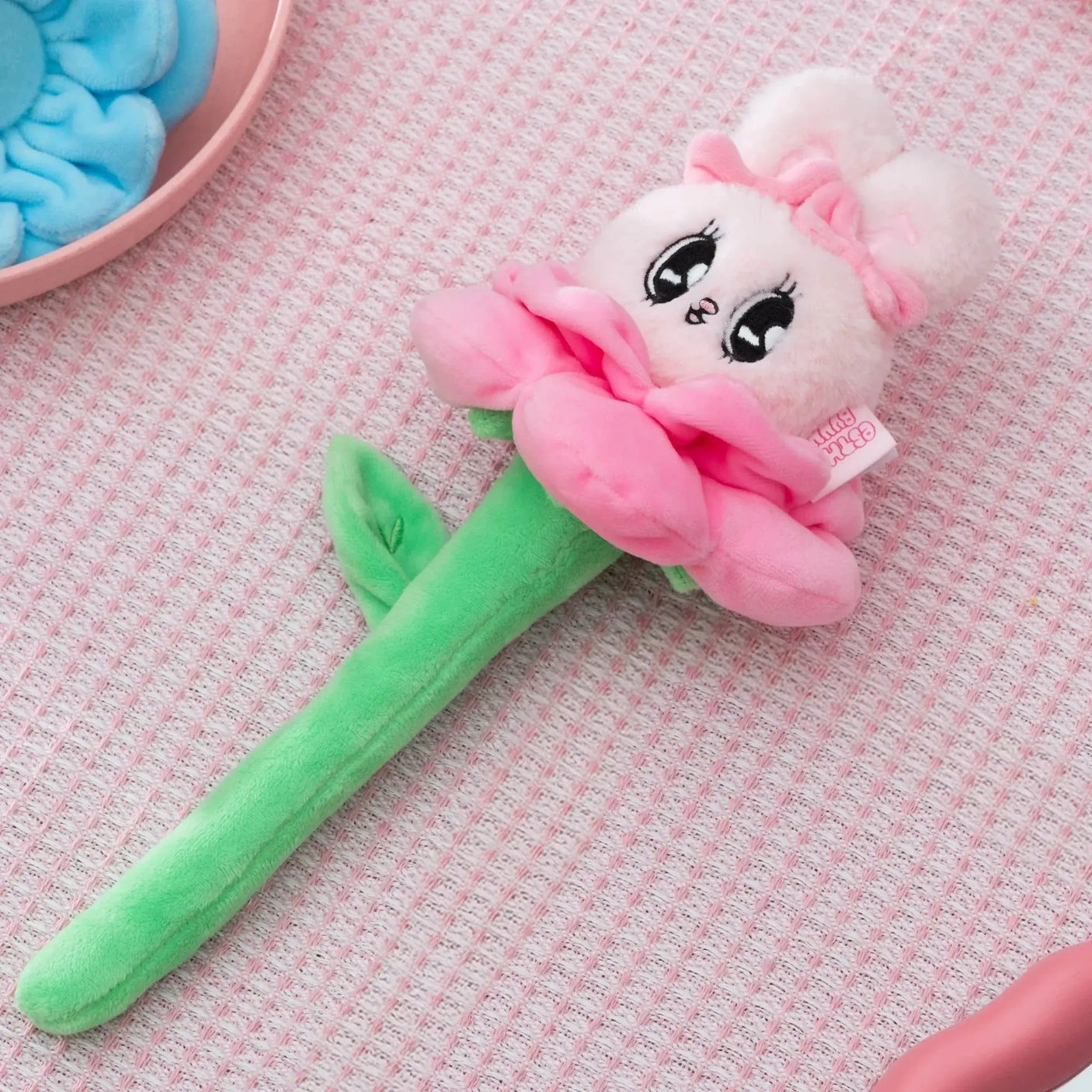 Pink plush bunny flower blind box toy with ruffled petals and green stem