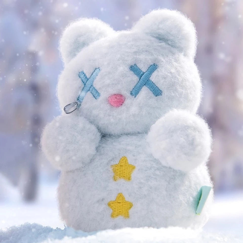 Fluffy white plush from Finding Unicorn Shinwoo Cold Hugs Blind Box with blue X eyes and yellow star buttons in snow