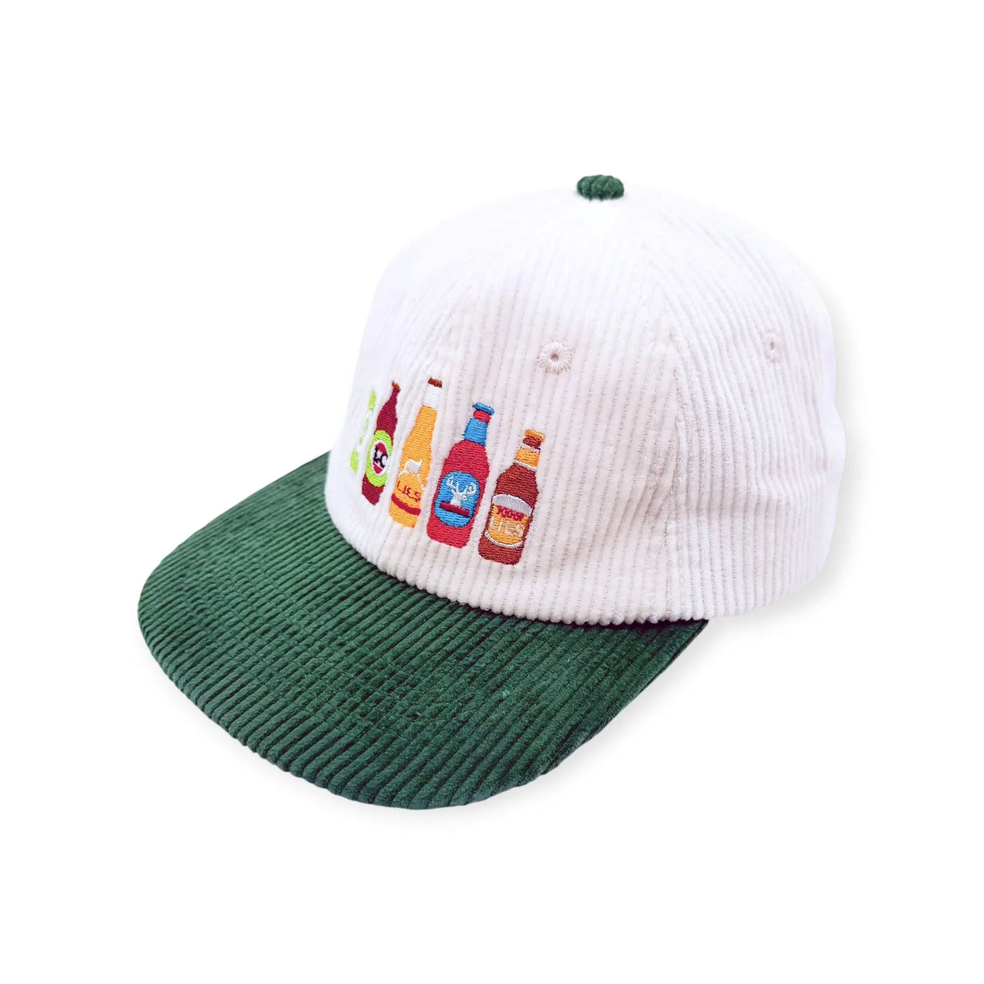 White corduroy cap with green brim and colorful beer bottle logo