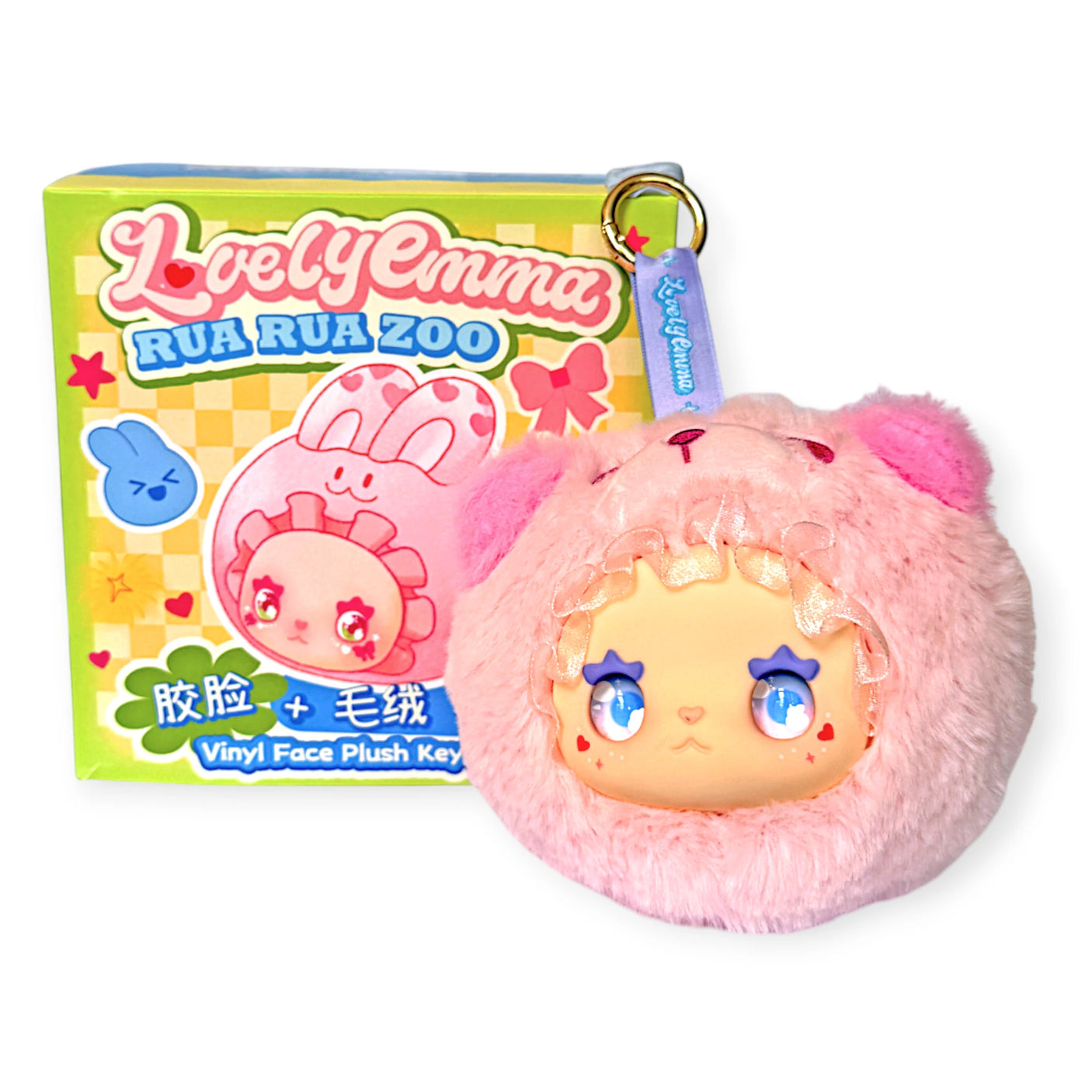 Pink plush Lovely Emma Rua Rua Zoo bag charm with vinyl face and ears, displayed next to colorful product box packaging