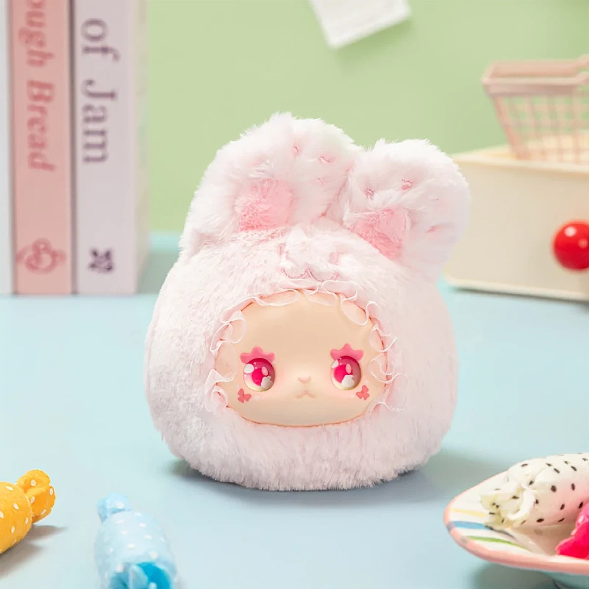 Cute Lovely Emma Rua Rua Zoo plush bag charm in pink bunny costume with star-shaped eyes on pastel background