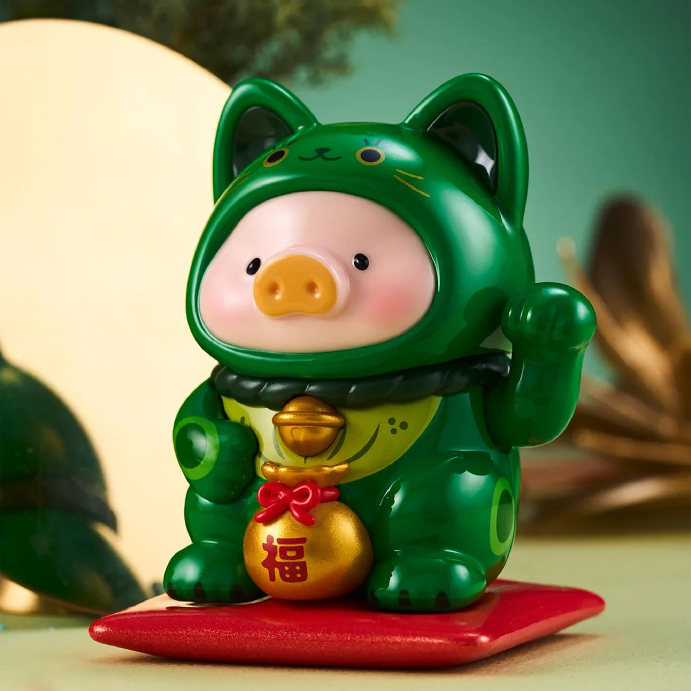 LuLu The Piggy - Lucky Cat Blind Box showing a piggy figurine in a green cat costume holding a gold charm by LuLu The Piggy