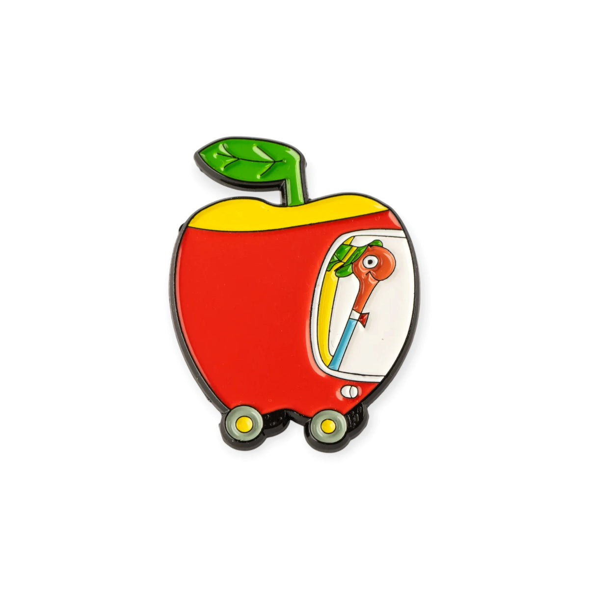 Red apple-shaped enamel pin with green stem and cartoon figure