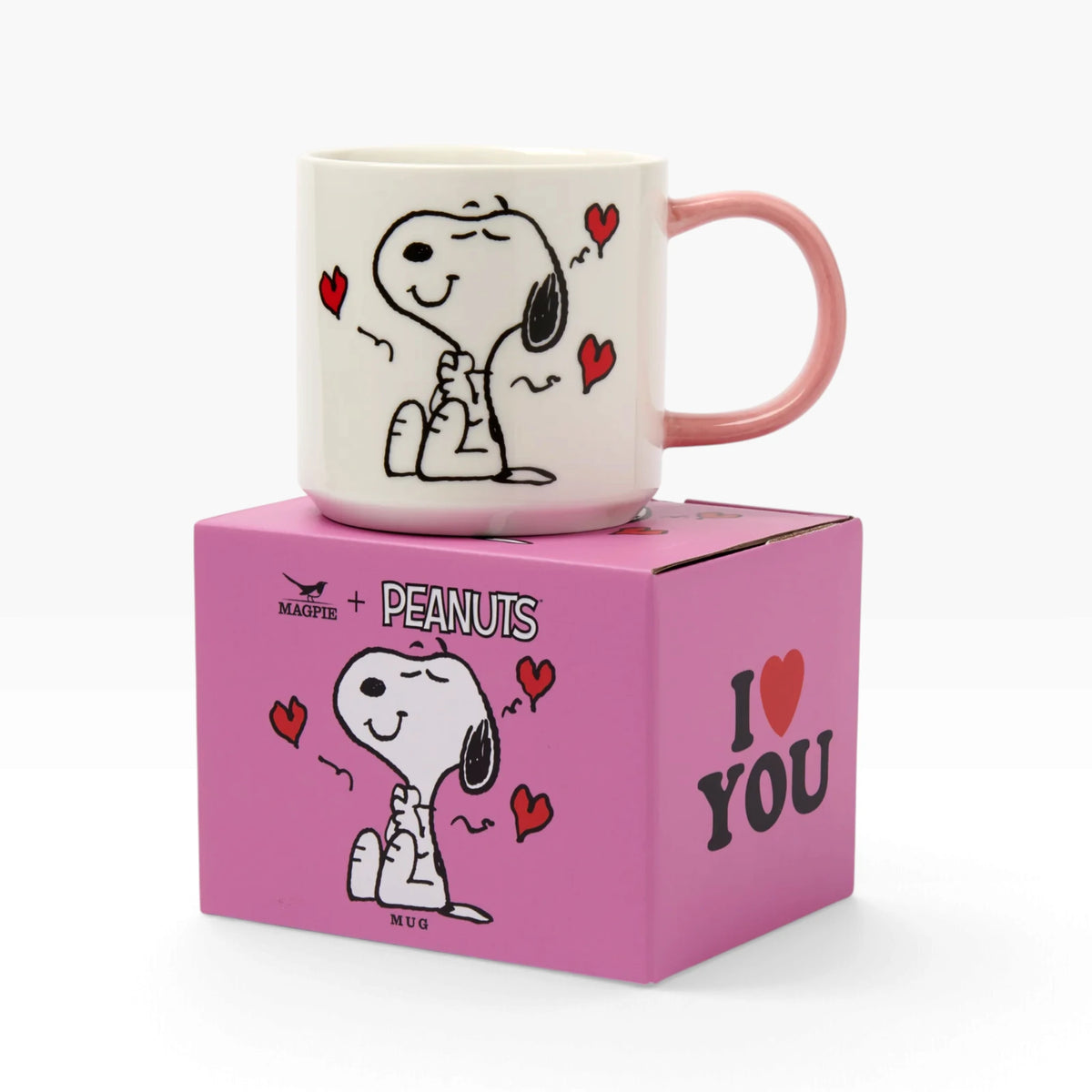Cream ceramic Snoopy mug with pink handle, sitting Snoopy and red heart pattern