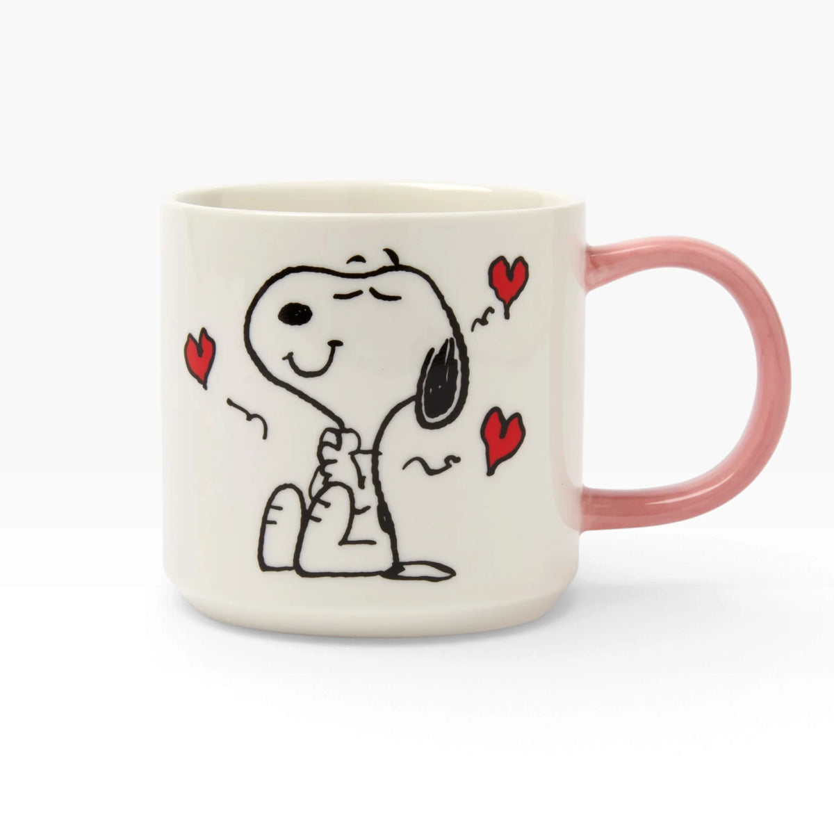 Cream ceramic Snoopy mug with pink handle, Snoopy sitting with red hearts