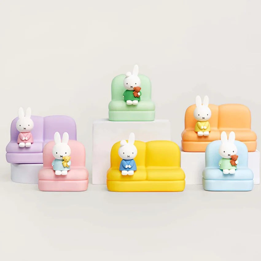 Multi-pack phone stand sofas with rabbit figures in purple, green, yellow, blue, and orange