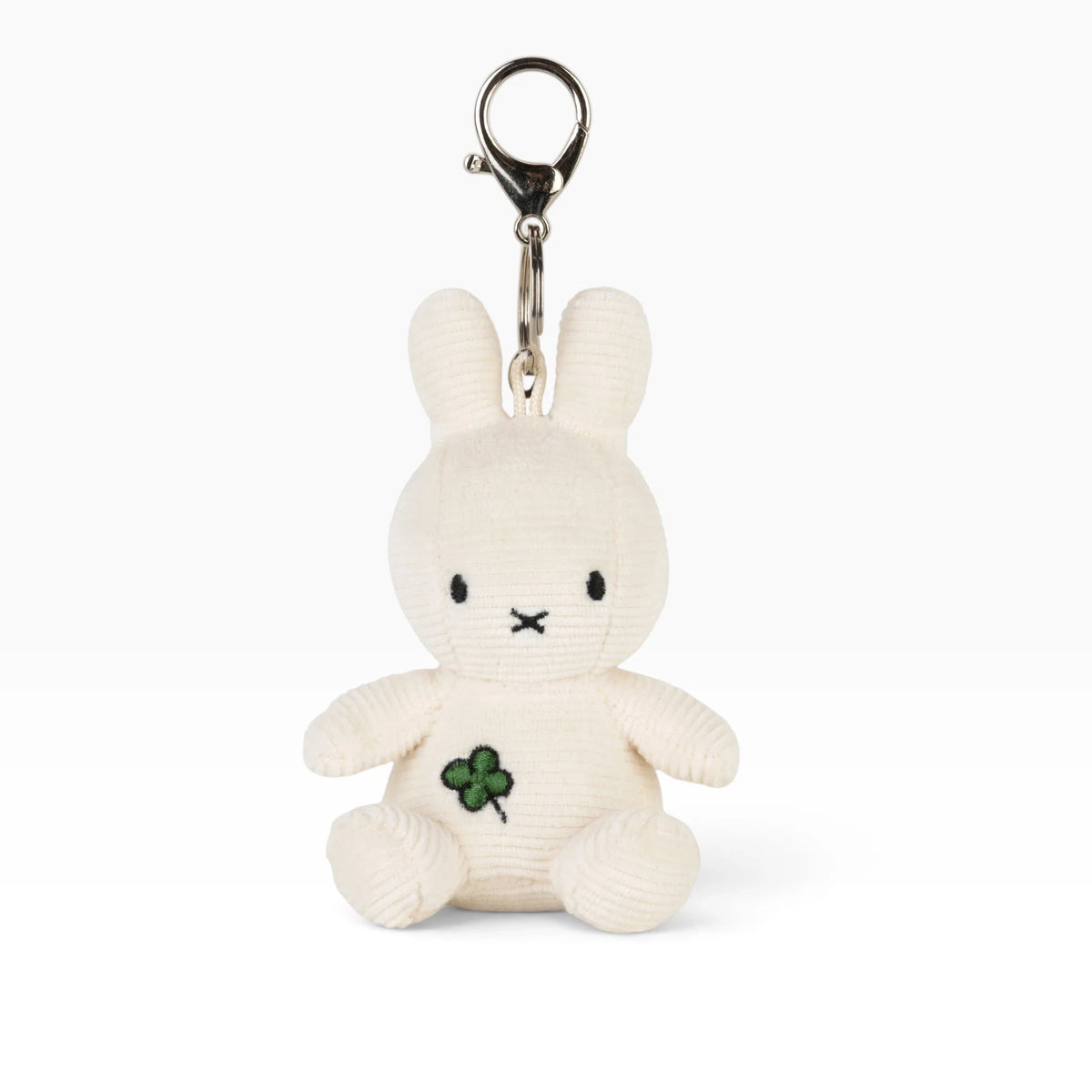 Cream plush bunny keychain with metal loop, black eyes and green clover