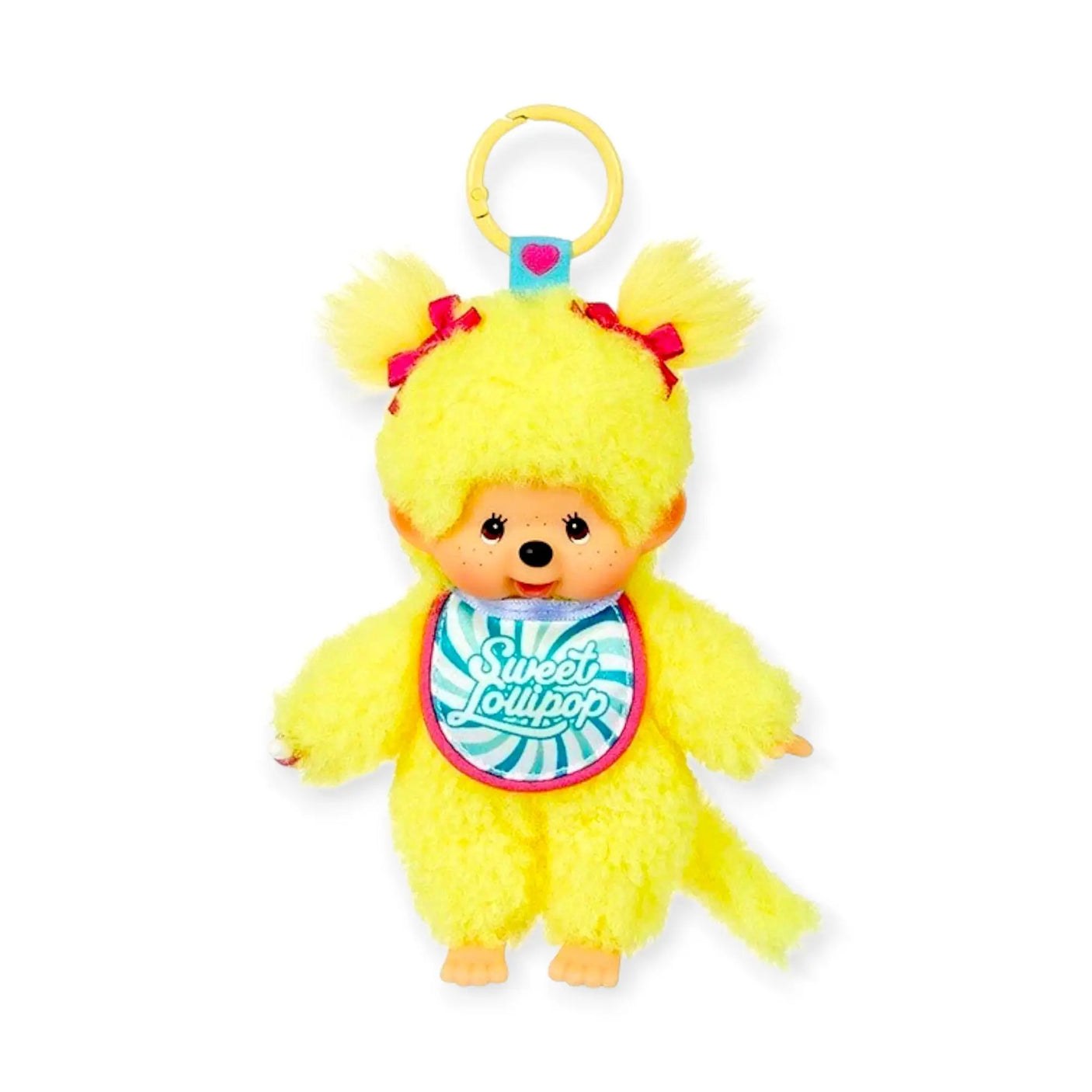 Yellow plush bag charm with smiling character and heart lollipop badge