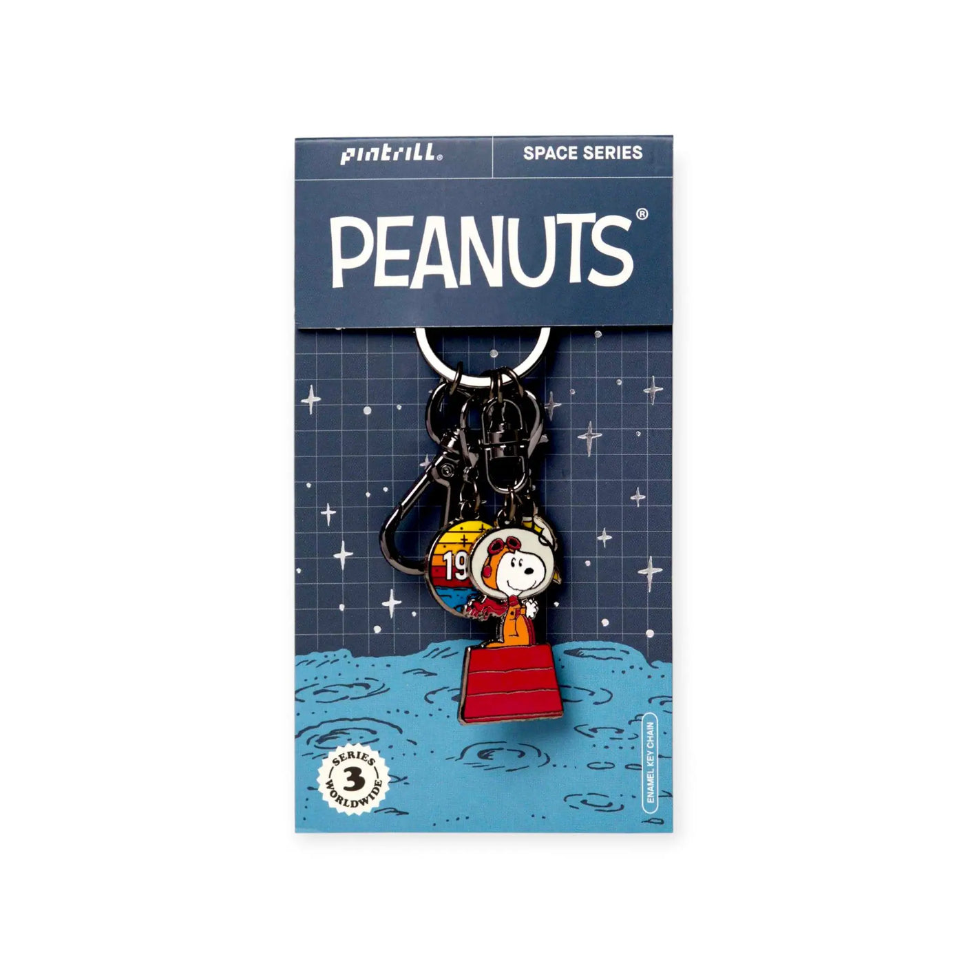 Snoopy and Woodstock space keychain on display card, Snoopy astronaut charm with red base