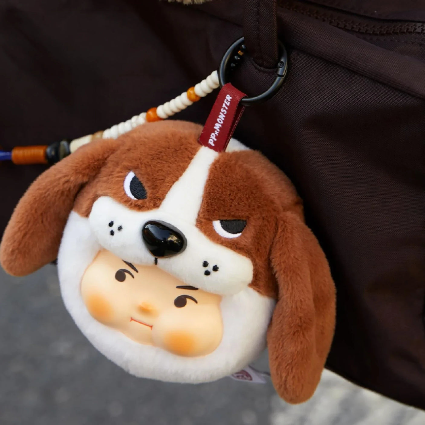 PP x Monster Puppy Bros Plush Keychain - Blind Box featuring a brown and white dog face with a human-like expression by ToyZero+