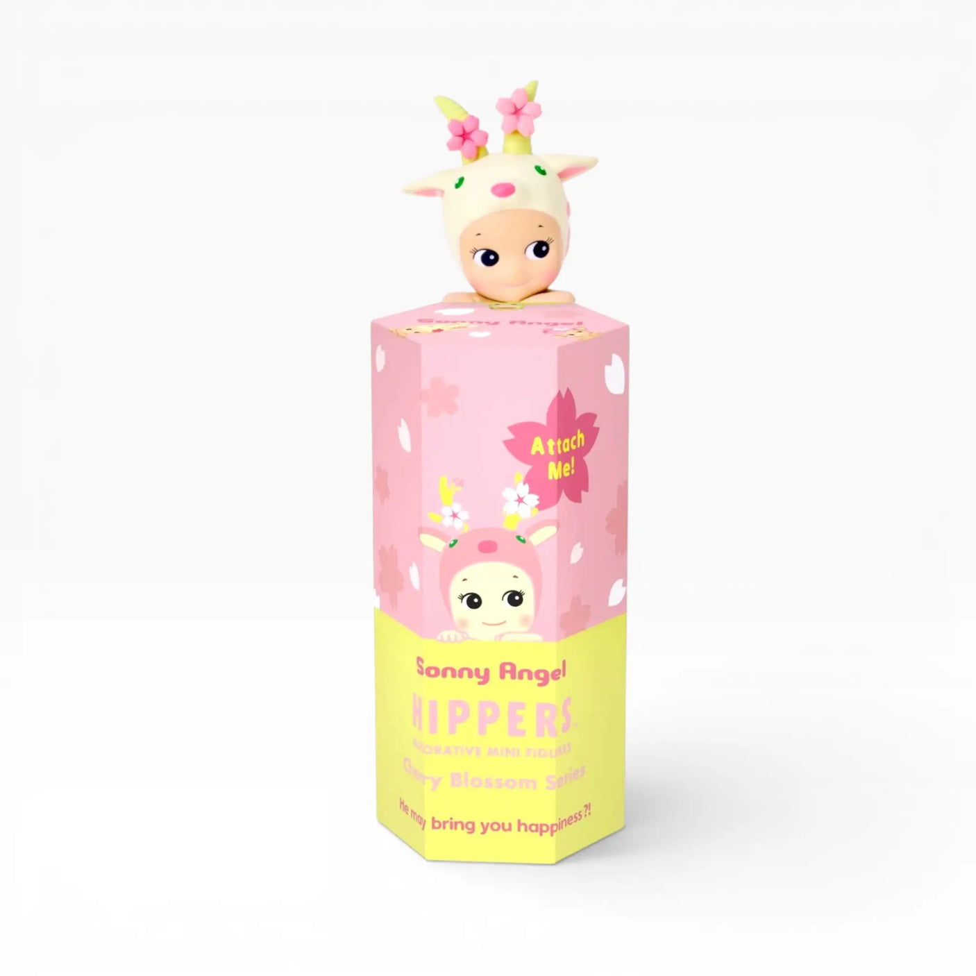Pink cherry blossom vinyl hipper toy in cube box with bunny-hat character