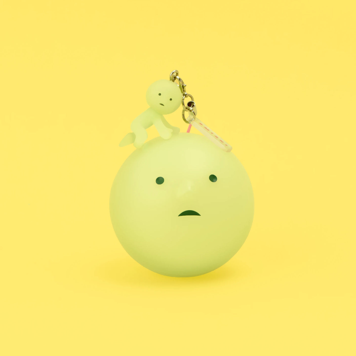 Light green Smiski strap keychain figure with metal clasp and key ring