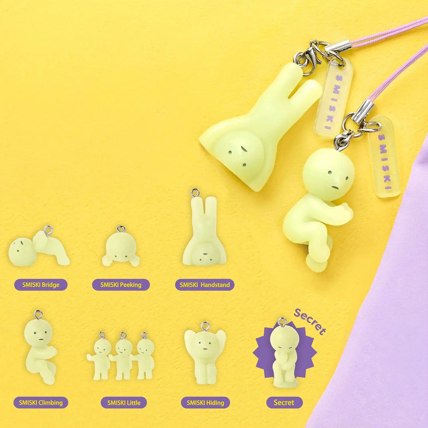 Assorted smiski strap keychain figurines with metal clasps and printed character tags