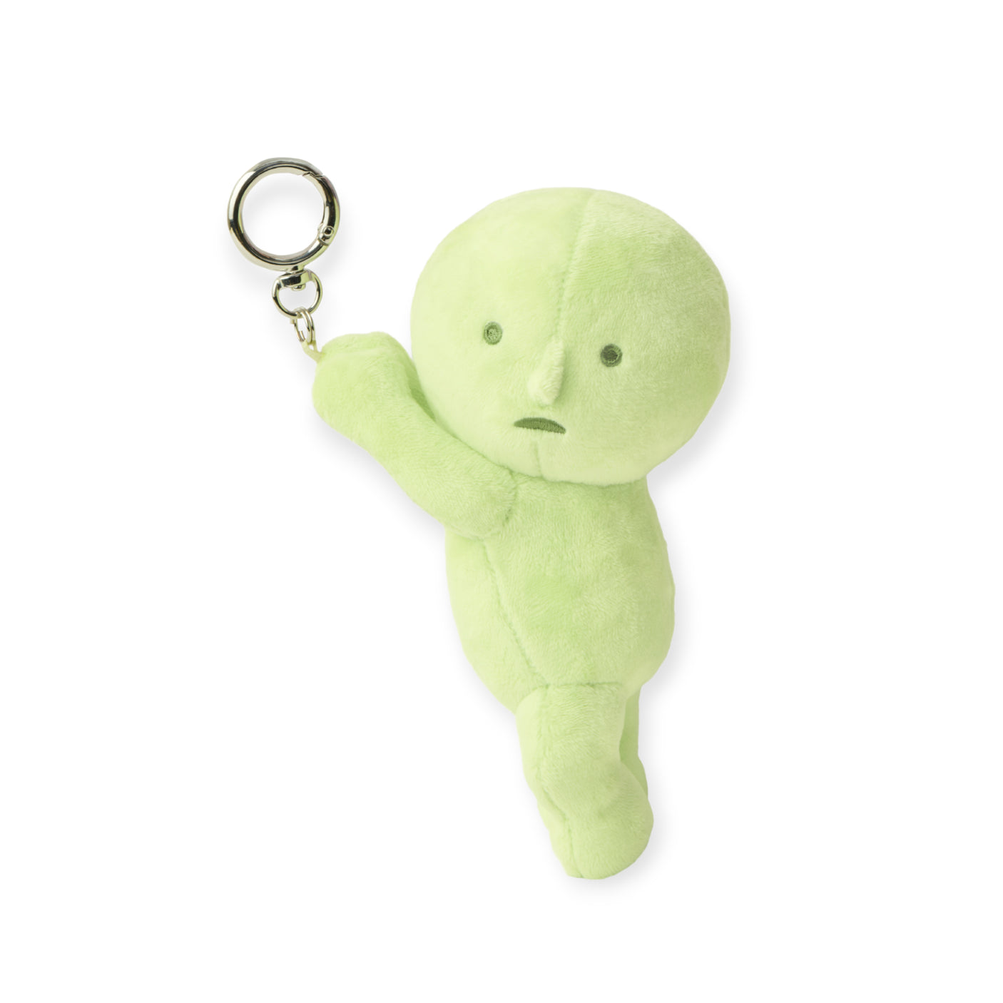 Light green Smiski plush keychain with round head and simple facial features holding silver keyring on white background
