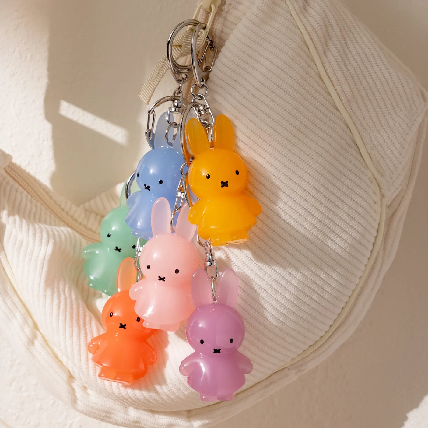 Pastel jelly rabbit keychains on metal rings, multicolor dangling rabbit charms