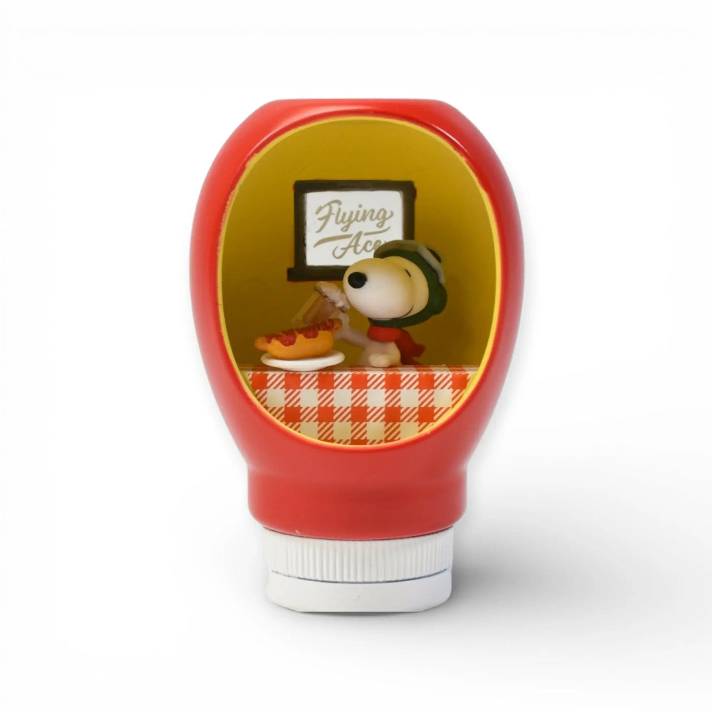Red squeeze bottle blind box figure with Snoopy vignette inside
