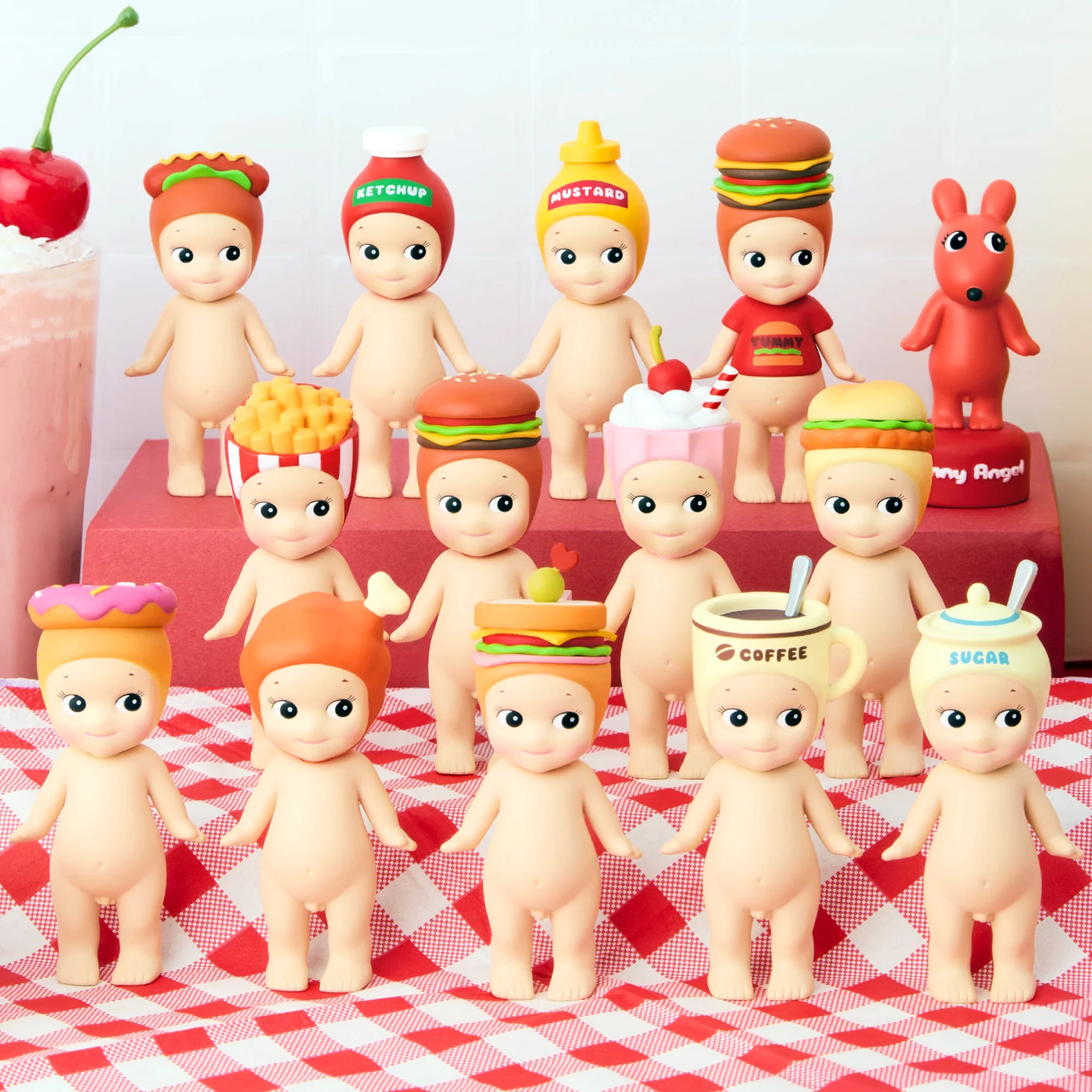 Fifteen Sonny Angel Snack Series - Blind Box mini-figures by Sonny Angel, each with food-themed headpieces like burgers and fries, stand on a red-checkered surface. A red animal figure adds whimsy to this charming collectible display.