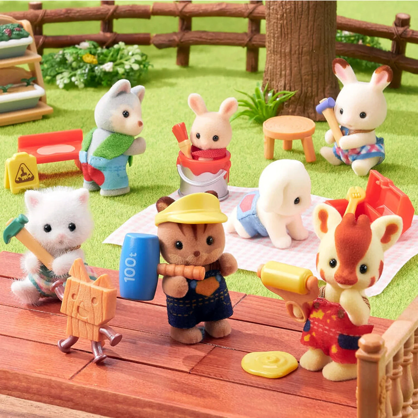 Sylvanian Families Blind Bag - Baby Builder features adorable Sylvanian Families babies in construction outfits with toy tools, set outdoors with props—ideal for fans and collectors of these charming figures.