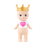 Part of the 20th Anniversary collection, this special edition Sonny Angel wears a gold crown and white shirt with a pink "Happiness" heart, making it an exceptional find for enthusiasts of the Collector's Guide.