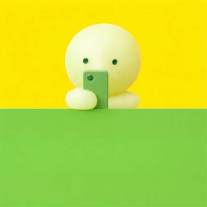 On His Smartphone figure from the Smiski Hippers Lineup