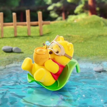 Carefree Moments figure from the Winnie the Pooh 100th Honey Quest Lineup