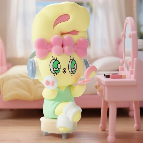 Yellow Esther Bunny figure with pink bow and headphones applying makeup at pink vanity in cozy pastel room