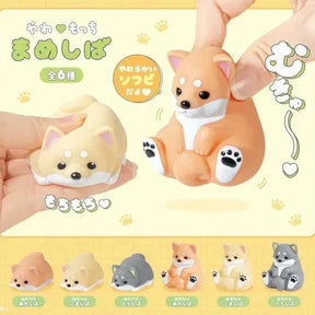 Two squishy Shiba Inu figures in hand from Shiba Squish Buddies Blind Box, shown in close-up, gallery position 1, IMG-7316.webp