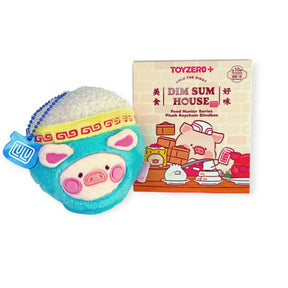 LuLu The Piggy - Dim Sum Food Hunter Keychain Blind Box showing a plush piggy in a turquoise dumpling costume with a yellow headband by LuLu The Piggy