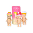 In front of a pink box labeled "Sonny Angel Sweets Series Blind Box" from the Sonny Angel brand, three collectible figures with cupcake-themed headgear are displayed as part of this exciting collection.