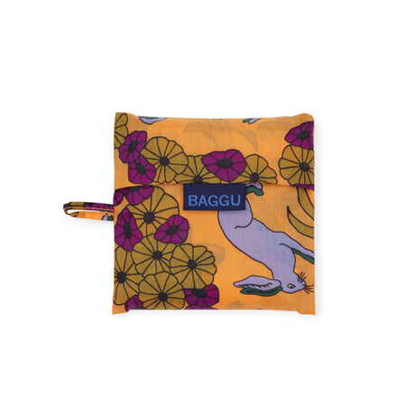 Folded Standard Baggu Bag in Wild Rabbit pattern with purple rabbits and floral design on orange, gallery position 1