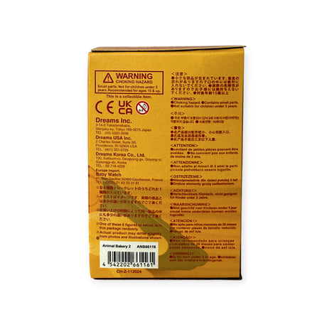 Back of an Animal Bakery Blind Box - Vol 2 by Dreams Inc displays warnings, safety labels, and distribution info in several languages. Barcode and identifiers are at the bottom for this safari-inspired treats collection.