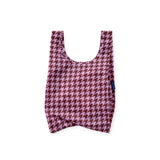 Pink houndstooth baby tote bag with wide U-shaped opening
