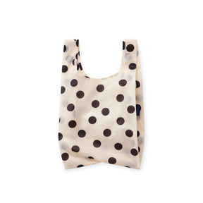 Cream polka-dot baby tote bag with short handles and open top, black dot pattern