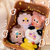 Baby Three - Kitten Wardrobe Keychain Blind Box dolls in varied cat costumes with bell necklaces inside a woven basket held by a person