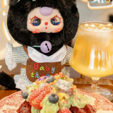 Baby Three - Kitten Wardrobe Keychain Blind Box doll in black cat costume with bell necklace, sitting beside dessert and drink