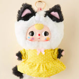 Baby Three - Kitten Wardrobe Keychain Blind Box doll in white and black cat costume with yellow polka dot dress and ring clasp